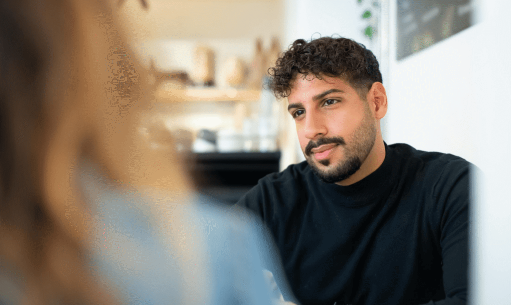 man looking tense in conversation