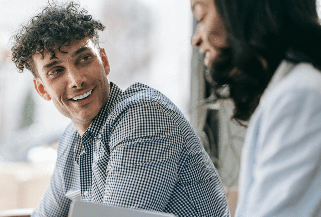 man relaxed smiling in conversation