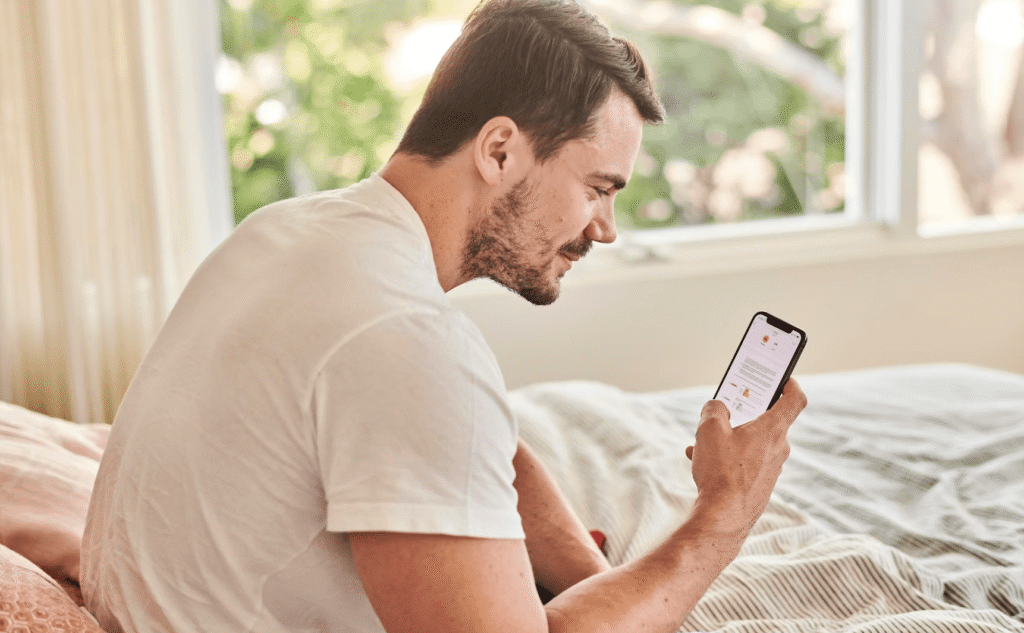 man scrolling phone distracted morning