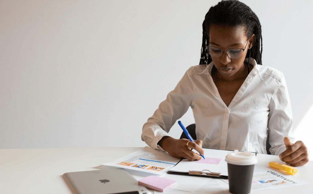 woman planning week calm focused desk