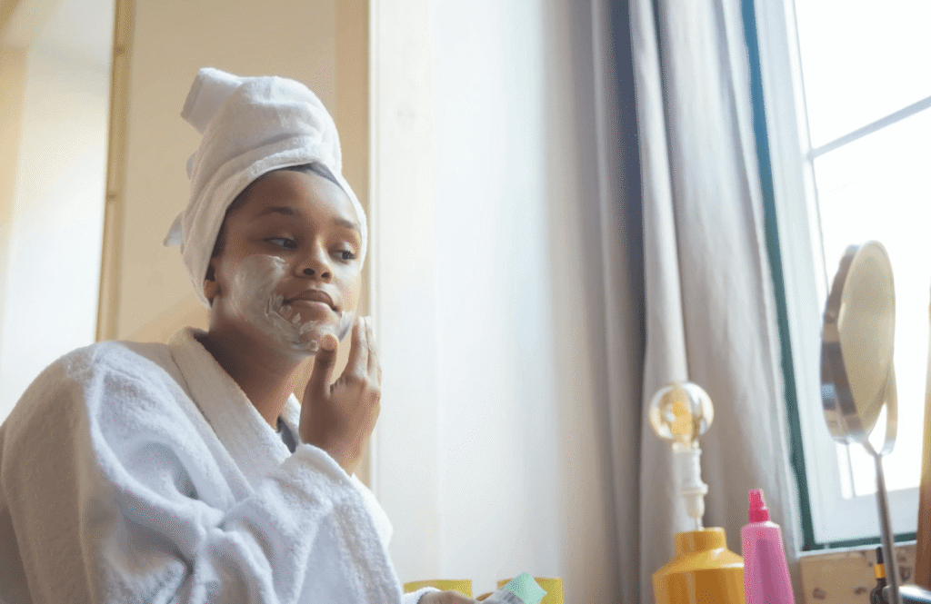 woman tired face mirror morning dull skin