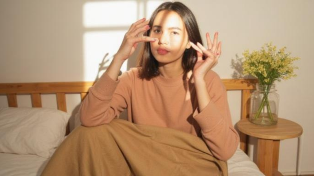 woman waking up early sunlight window calm
