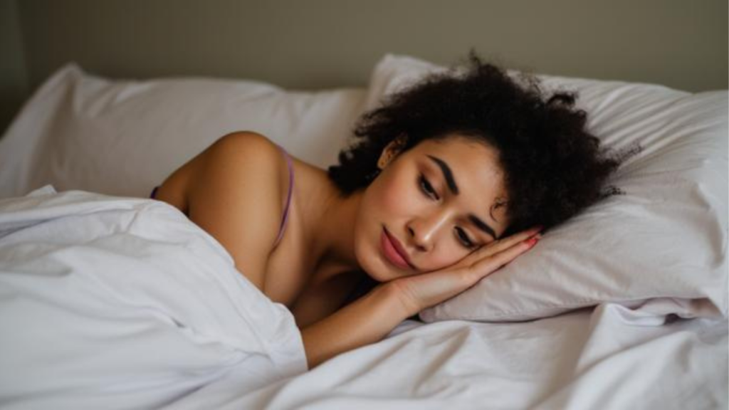 woman waking up tired Monday morning