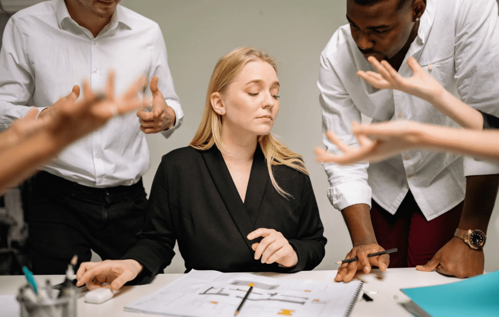 woman with controlled expression in group